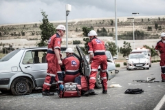 ER24 File - paramedics treating patient inside of car